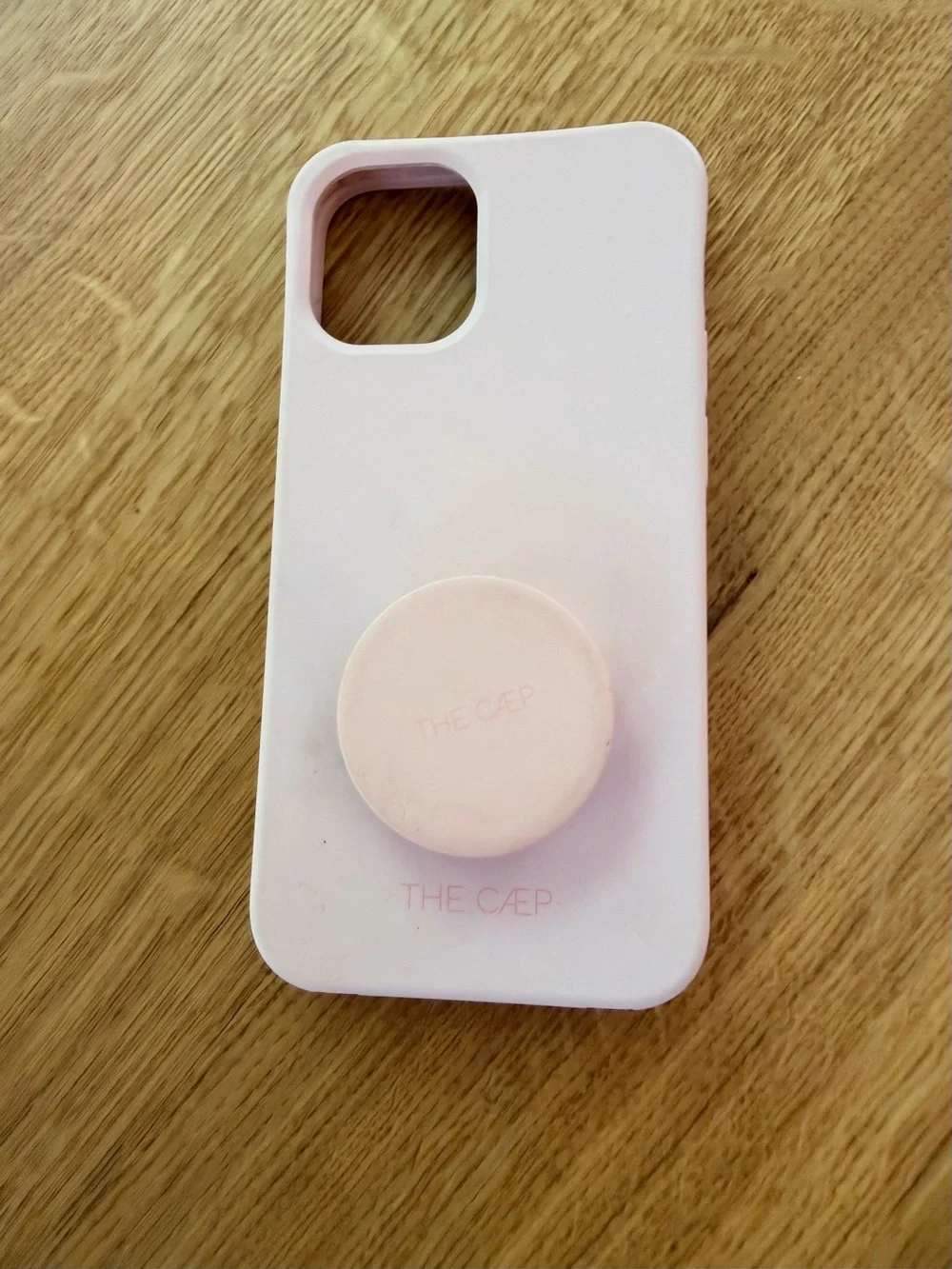 the caep Pink Silicone Phone Case with Matching Pop Grip 12pro iphone